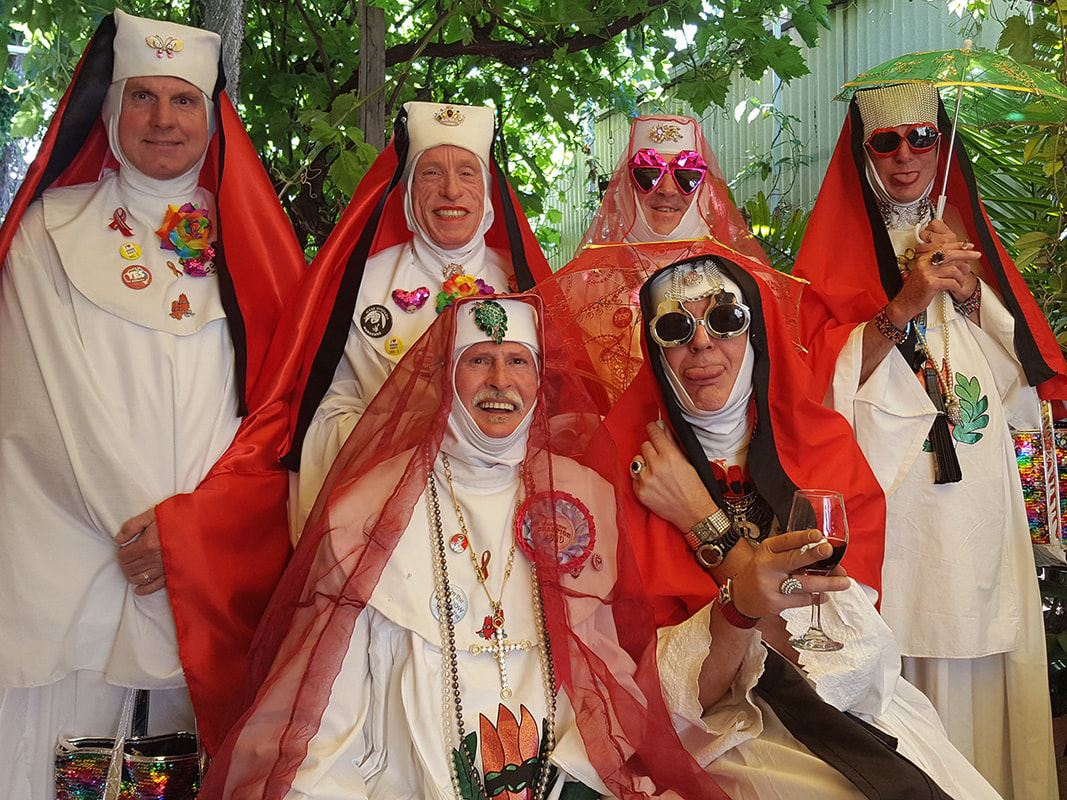 Mother Indulge Me (seated, left) with the Sisters of the Order of Perpetual Indulgence 's Adelaide House, prior to the 2018 Adelaide Pride March.